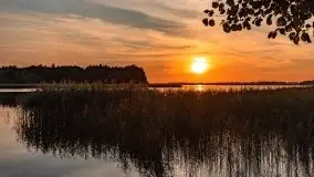 Ognisty zachód przy porcie Ognisty Ptak, jezioro Święcajty - zdjęcie 9