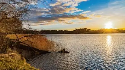 Zachód słońca nad jeziorem Tajty, widoczny z Pięknej Góry