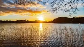 Zachód słońca nad jeziorem Tajty, widoczny z Pięknej Góry - zdjęcie 23