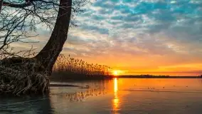 Zachód słońca nad jeziorem Dobskim, marzec 2022 r. - zdjęcie 8