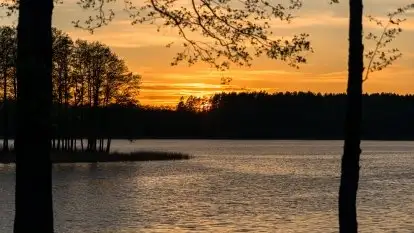 Zachód słońca nad jeziorem Ryńskim, Rybical