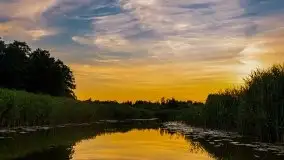 Zachód słońca, widok z wody na jezioro Święcajty - zdjęcie 16